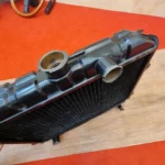 ke26 NOS OEM radiator 5