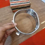 Datsun Sunny 1200 B110 headlight bezel left side2