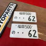 Original Japan uncut license plates number 62 1