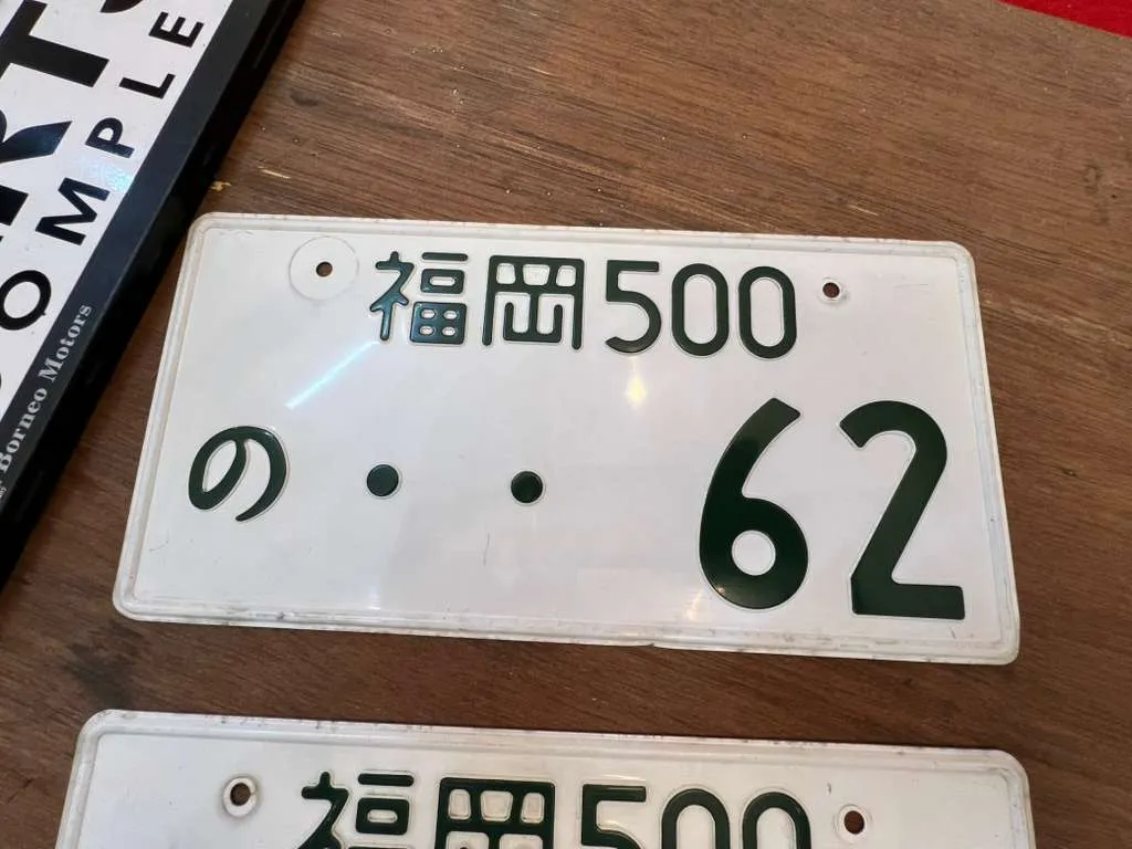 Original Japan uncut license plates number 62 3