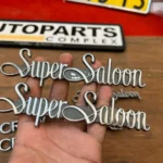 Toyota Crown 1983 - 1987 Super Saloon emblem badge pair 1