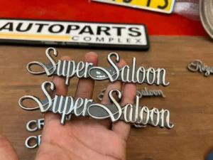 Toyota Crown 1983 - 1987 Super Saloon emblem badge pair 1