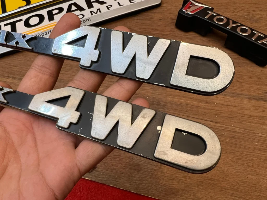 Toyota Hilux pickup 1979 - 1983 RN30 RN40 4WD fender badges (3)