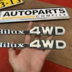 Toyota Hilux pickup 1979 - 1983 RN30 RN40 4WD fender badges pair (2)