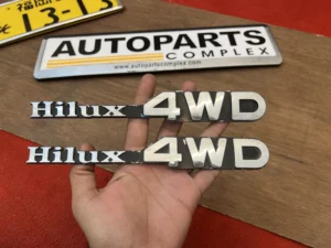Toyota Hilux pickup 1979 - 1983 RN30 RN40 4WD fender badges pair (2)