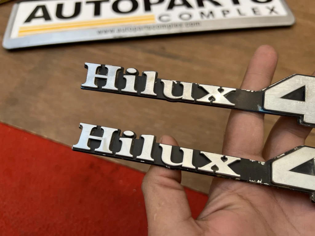 Toyota Hilux pickup 1979 - 1983 RN30 RN40 4WD fender badges pair (4)