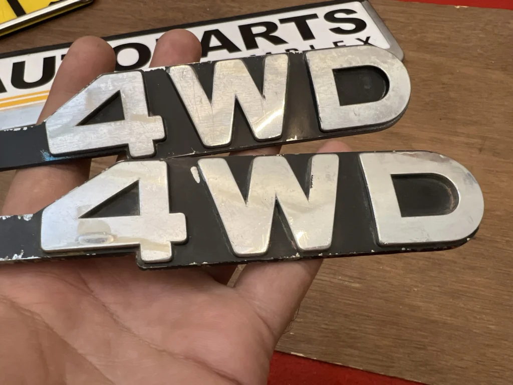 Toyota Hilux pickup 1979 - 1983 RN30 RN40 4WD fender badges pair (5)