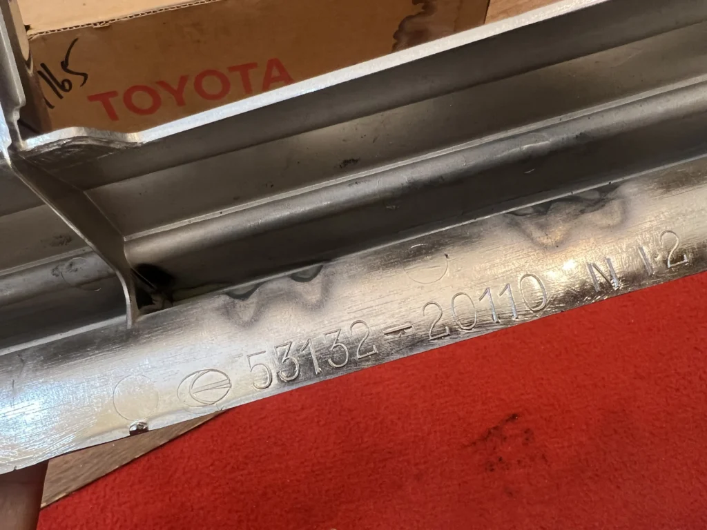 Corona 1979 1980 1981 RT130 Tt130 NOS OEM headlight bezels left side (1)