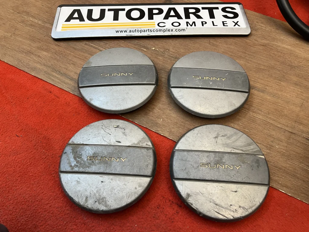 Nissan sunny B11 wheel center caps (2)