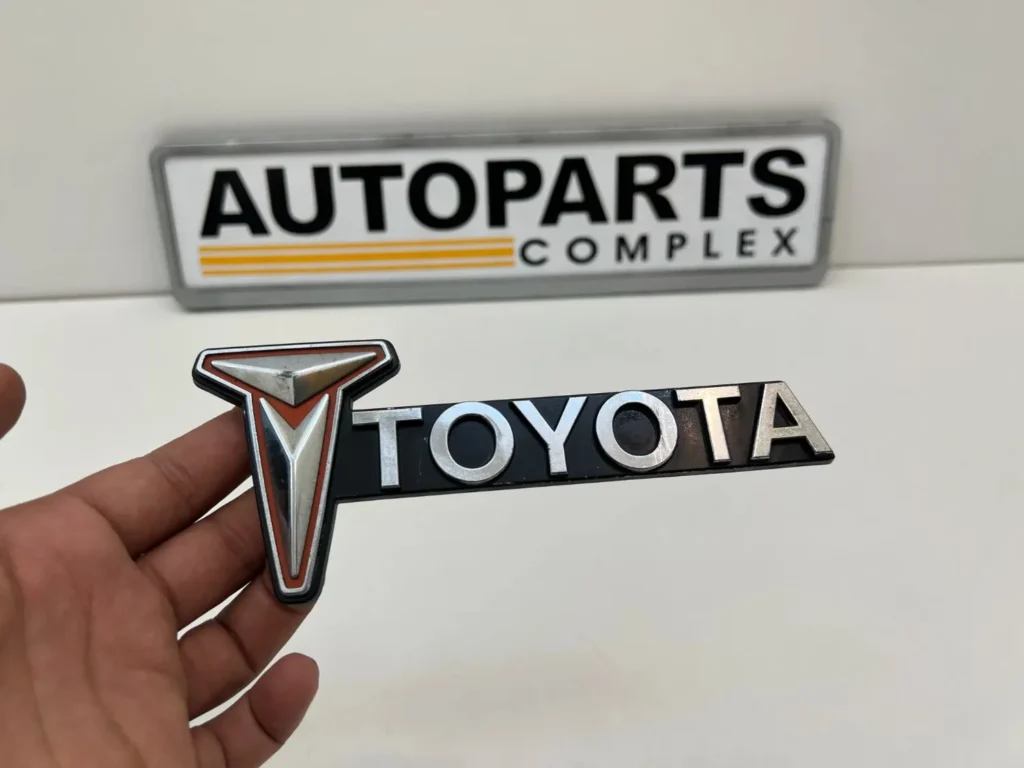 Toyota Hilux 1979 1980 RN30 RN40 RN36 grille badge OEM used (2)
