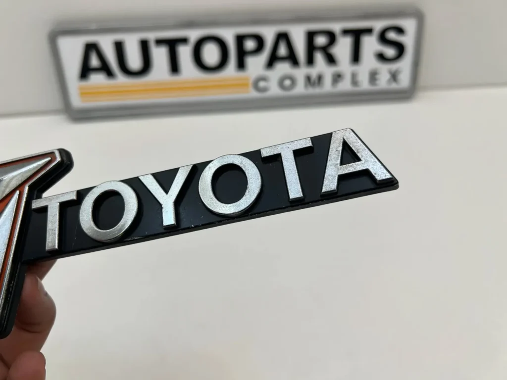 Toyota Hilux 1979 1980 RN30 RN40 RN36 grille badge OEM used (4)