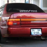 Corolla 1993 - 1997 AE100 AE101 OEM tail lights set with center garnish (1)