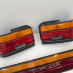 Corolla 1993 - 1997 AE100 AE101 OEM tail lights set with center garnish (9)