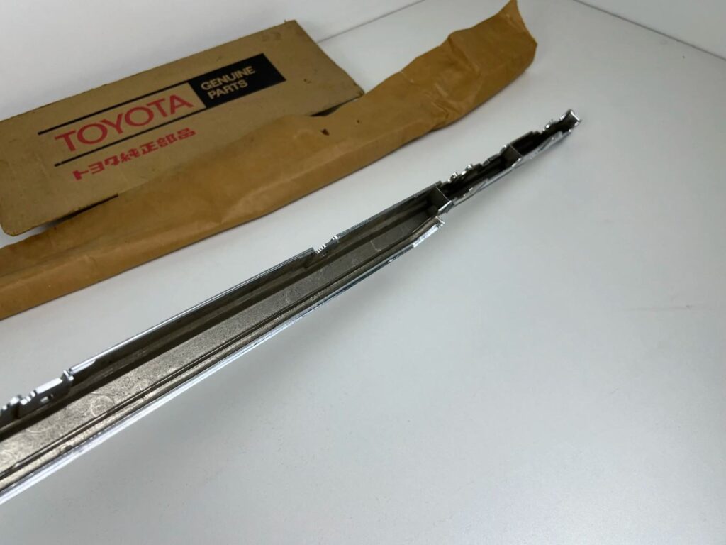 Corona 1981 1982 1983 RT13# Tt13# XT13# NOS OEM radiator upper chrome trim (1)