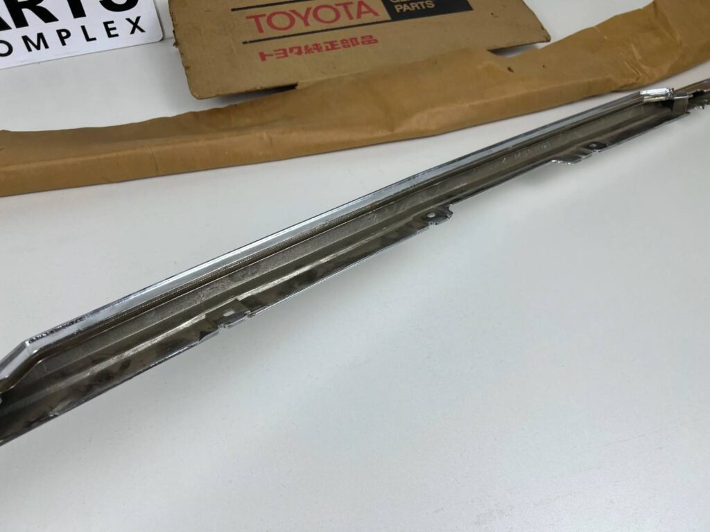 Corona 1981 1982 1983 RT13# Tt13# XT13# NOS OEM radiator upper chrome trim (13)