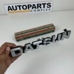 DATSUN 720 Pickup Front Grille Emblem Badge NOS (5)