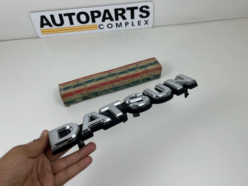DATSUN 720 Pickup Front Grille Emblem Badge NOS (6)