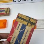 Datsun 720 Pickup Front Bumper Turn Signal Lamp Light Lens Set 26126-02W00 NOS (1)