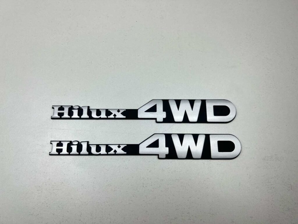 Hilux 1979 - 1983 4WD RN30 Ln40 RN36 fender badges pair (8)