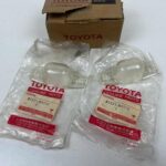 Toyota Hilux rn30 rn40 rn43 license plate light lenses NOS OEM pair (3)
