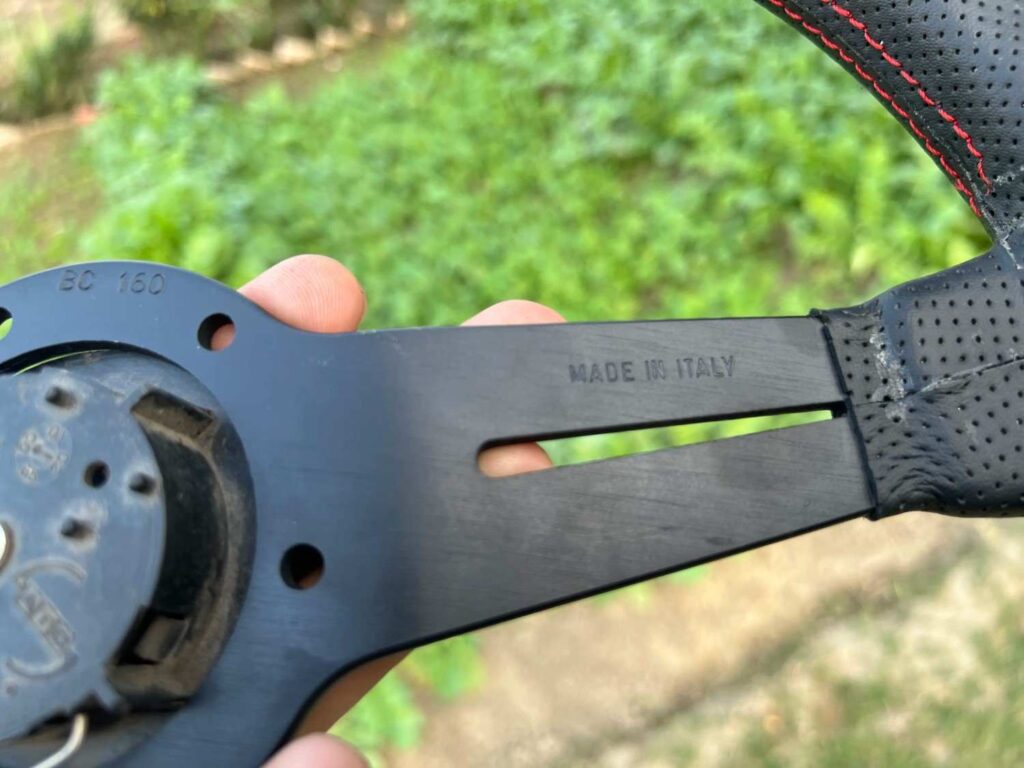 Nardi 360mm Re-leather stitched all black with red stitch thread (10)
