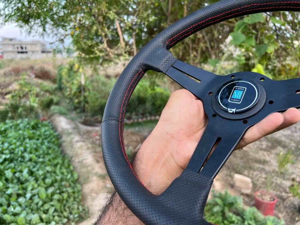 Nardi 360mm Re-leather stitched all black with red stitch thread (5)