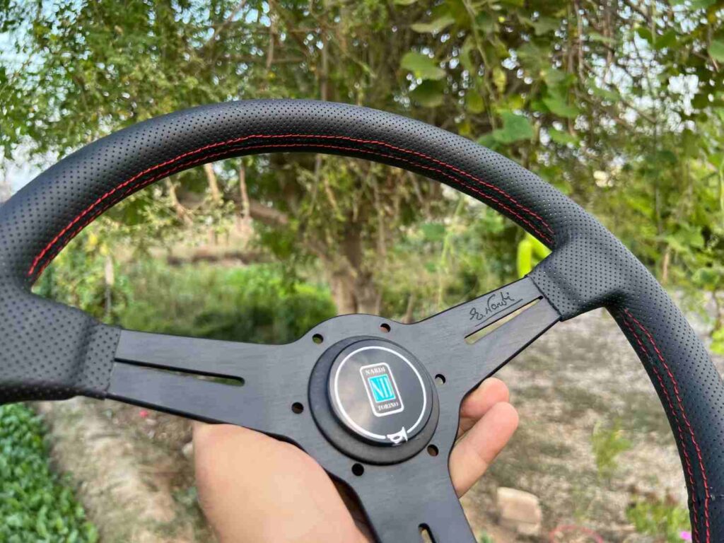 Nardi 360mm Re-leather stitched all black with red stitch thread (6)